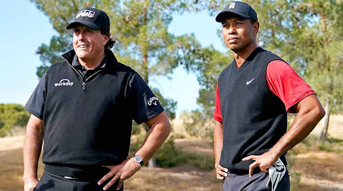 Phil Mickelson and Tiger Woods are pictured at The Match in 2018.